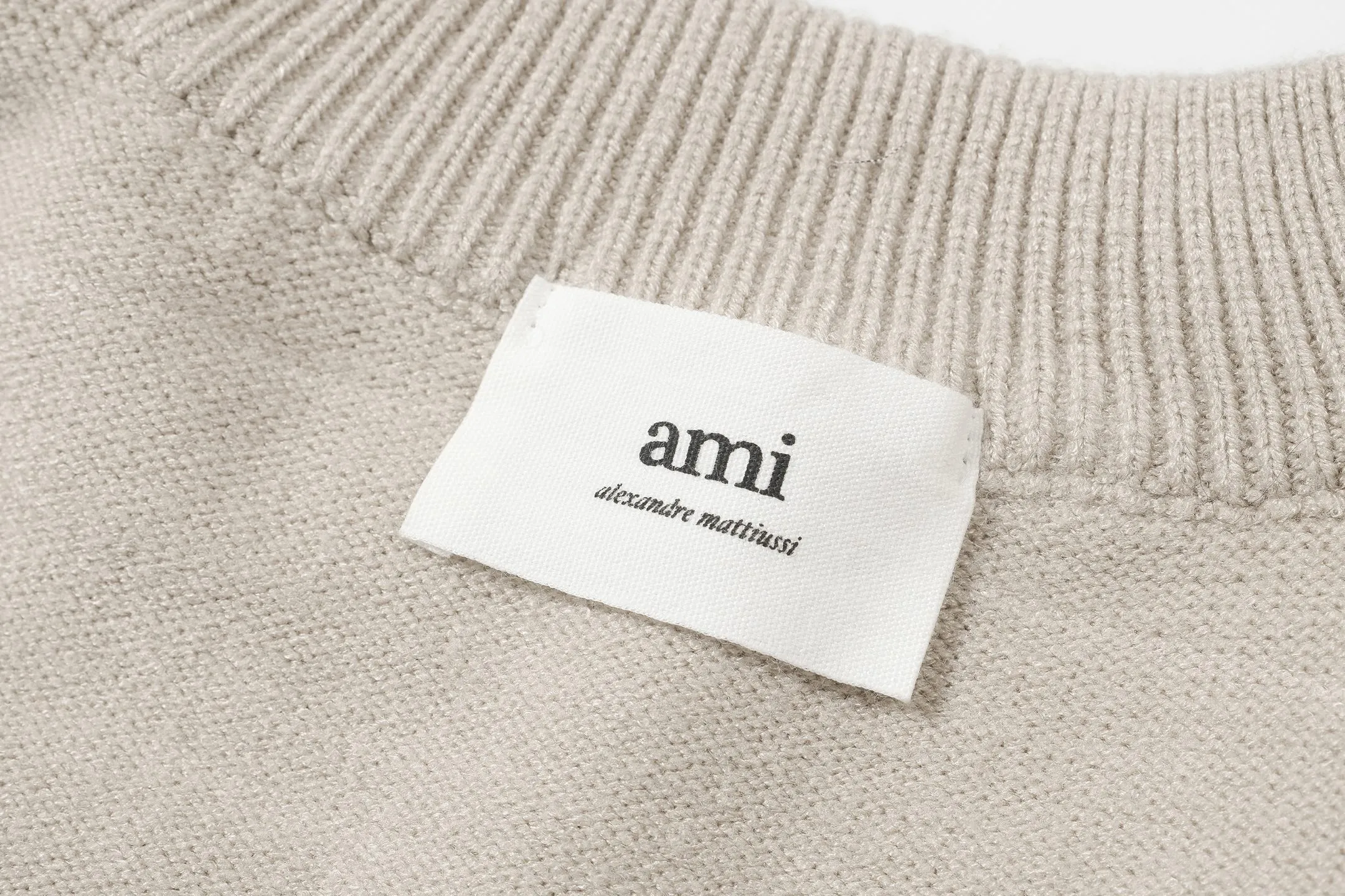 Milk tea color In Stock 🚨 A 9008#AM French minimalist style peach heart logo reverse rib round neck sweater Camel Royal Blue Light Blue Milk tea color White black heart Black red heart 116 A 9008#21019003